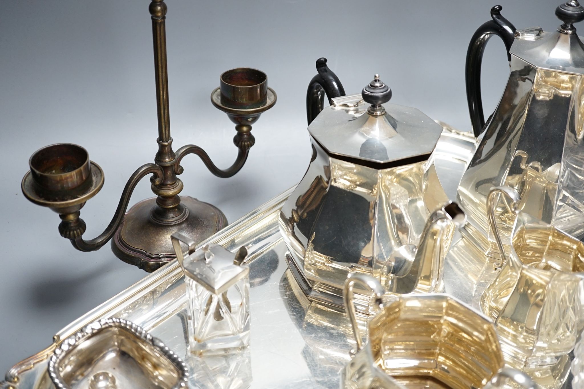 A quantity of silver plated tea/coffee wares including two handled tray, decanters, salts etc., 62cm